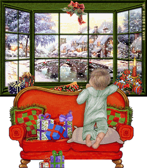 bambino guarda dalla finestra la neve che scende
